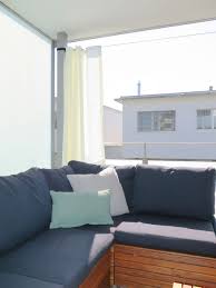 Eine attraktive kombination aus holzsichschutzzaun und steinwand für die duschkabine! Outdoor Vorhang Santorini Nach Mass Weiss Vorhang123 At
