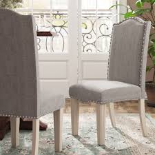 This curved back upholstered dining chair does so much more than provide seating in the dining room. One Allium Way Mercedes Upholstered Side Chair In Gray Reviews Wayfair