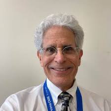 Dr. Christopher Tanga, DO