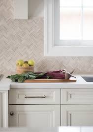 Ivory Kitchen Cabinets With White Quartz Countertops Continue With Light Decor By Addi Trendy Kitchen Tile Ivory Kitchen Cabinets Backsplash For White Cabinets