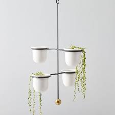 Photo courtesy of west elm. Mobile Hanging Planters