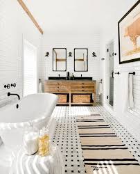 Thinking of renovating your bathroom? A Vintage French Burlap Bathroom Rug Runner Layers Over Vintage Carrara Marble B Bathroom Inspiration Modern Farmhouse Bathroom Decor Modern Farmhouse Bathroom