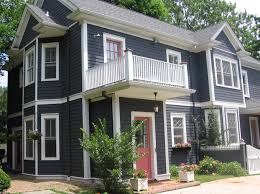 The three neighboring houses in this photo are painted taupe, gold, and slate blue. Colonial House Northport N Y Painted With Cabot S Slate Gray Exterior Solid St American Traditional Exterior New York Houzz