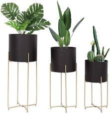 Fitted with a removable stand, our brass planter elevates the status of your potted plants and flowers.it has a sleek, cylindrical shape for a look that's mini malistic yet stylish. Buy Mid Century Planter With Gold Plant Stand 3 Pcs Modern Planters For Indoor Plants Metal Floor Planter Set With Foldable Stand Pack Of 3 Online In Indonesia B088rfprz6