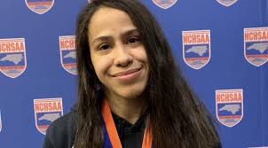 Local athletes make history as first girls wrestling champions