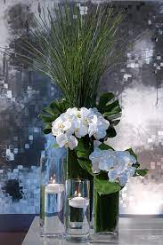 Tips For Decorating Weddings With Candles Jamali Garden Beach Wedding Centerpieces Wedding Flowers Wedding Centerpieces
