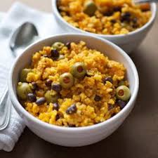Add rice to the pot and stir to coat. Puerto Rican Rice With Green Olives And Black Beans Food Mexican Food Recipes Puerto Rico Food
