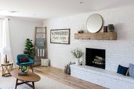 Family Room Accent Wall With White Painted Brick Wall And Barn Wood Mantel Brick Wall Living Room Living Room White Accent Walls In Living Room