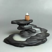 How does a backflow incense burner work? Japanese Ceramic Backflow Incense Burner A Moving Breathing Work Of Art Handcrafted With Purpl Backflow Incense Burner Incense Burner Ceramic Incense Holder
