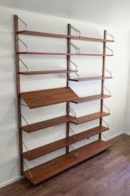 What are the best floating shelves? Teak Royal System Modular Wall Shelves By Poul Cadovius For Cado 1960s For Sale At Pamono