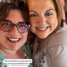 I had to take the girls to the dentist today and they always like a picture  out front. They coerced Nana into going along too. Needless to say, it's  never boring around