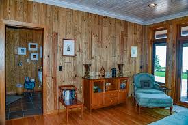 Remove surface dust and cobwebs from wood walls or paneling that can be treated with an oil additive. 4 Types Of Wood Paneling For Your Log Home Renovation