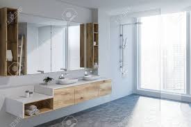 Maybe you would like to learn more about one of these? Modern Bathroom Corner With White Walls Concrete Floor Double Sink Standing On Wooden Countertop And Large Mirror Glass Door Shower 3d Rendering Stock Photo Picture And Royalty Free Image Image 110246298