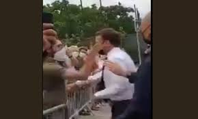 Emmanuel macron was slapped in the face by a man during a walkabout in southern france. Idrbwfk0c5 Jjm