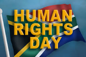 This day marked an affirmation by ordinary people. Human Rights Day South Africa Flag In Background