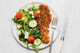 Season with salt, pepper, and a sprinkle of sugar if desired. Crispy Panko Chicken With Arugula Parmesan And Roasted Tomatoes Recipes