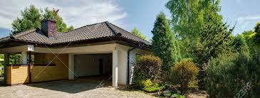 Most cars today are between 15' and 17' long. Open Car Garage In Contemoprary House With Garden Stock Photo Picture And Royalty Free Image Image 58219705