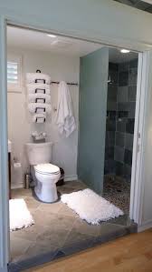 A handy bar below holds hand towels. 15 Best Towel Storage Small Bathroom Ideas Towel Storage Small Bathroom Home Diy