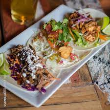 While i love the classic all american beef taco, fish tacos are refreshing and always a winner. Taco Plate Brisket Fish Chicken Tacos All American Pub Flickr