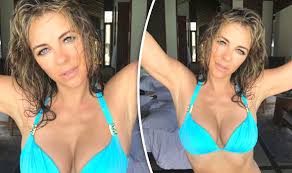 As of 2021, the net worth of elizabeth hurley is over $45 million. Elizabeth Hurley 52 Sparks Frenzy With Boob Baring Snap Thanks To Plunging Blue Bikini Celebrity News Showbiz Tv Express Co Uk