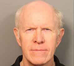 Former church deacon accused in sex abuse of 2 young girls surrenders