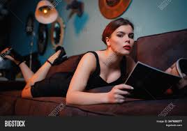 190 unique pictures for coloring from the game can be downloaded or printed directly from the site. Girl Lying On Sofa And Reading Magazine Attractive Woman Relaxing At Home Looking For Latest Fashi Image Stock Photo 247620277
