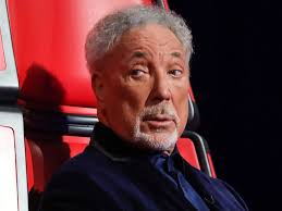 The Voice singer stuns Tom Jones as he is revealed as legendary Lonnie  Donegan's son
