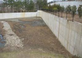 This is especially important if the building site has sandy, loose soil—these blocks will help maintain the pond's shape and height. Retaining And Detention Structures Haines Gipson Associates