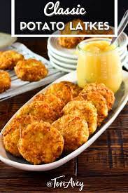 Classic Potato Latkes Learn To Make Crispy Flavorful Jewish Potato Latkes For Hanukkah Latkes Potato Jewish Recipes Jewish Cooking Food Processor Recipes