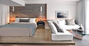 This architectural feature meant that the entryway of the bedroom was lost space that couldn't be significantly utilized in the room's layout. Get Bedroom Design Ideas From This Hotel Room With A Wood Platform And Built In Sofa Architecture Design Competitions Aggregator