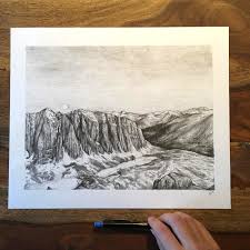 George's shoe is in the foreground, and iceberg lake at 12,000 feet is below. Sanna Wandtke Illustration