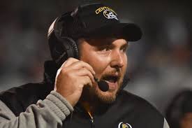 Golden Eagles still run this district: Ground game helps Johnson Central  outlast Tomcats for title