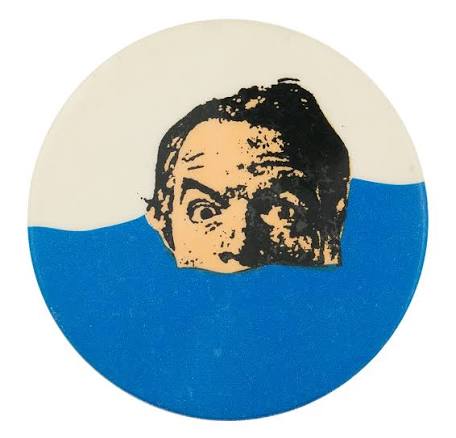 Swimming to Cambodia — EN0495 | Busy Beaver Button Museum