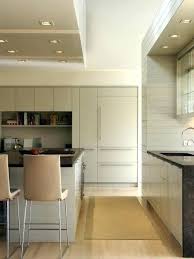 Flat Front Kitchen Cabinets Flush Kitchen Cabinets Or Example Of A Trendy Kitchen Design In Other Contemporary Kitchen White Modern Kitchen Modern Wood Kitchen