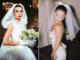 Ariana grande's surprise wedding over the weekend led some fans to jokingly share photos from a 2011 episode of nickelodeon's icarly in which she wore a wedding dress. Ariana Grande S Wedding Dress Looked Like Audrey Hepburn Movie Gown