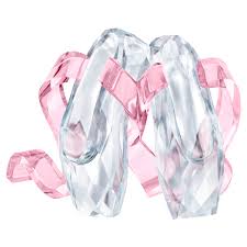 I remember my parents presenting this book to me after one of my very early dance recitals. Ballet Shoes Swarovski Com