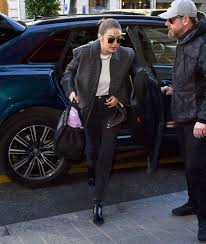 Gigi hadid changes into multicolor coat for lunch in new york city. Gigi Hadid In A Black Jeans Was Seen Out In Paris 01 17 2020 Lacelebs Co