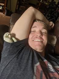 Me and my boy Kipo. He likes to hang out in my armpit lol : rConures
