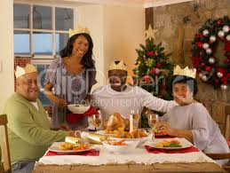 In many ways the meal is similar to a standard sunday dinner. Adult African American Family Having Christmas Dinner Royalty Free Images Photos And Pictures