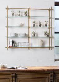 Open Brass And Glass Shelves In The Kitchen Has A Clean Timeless And Refined Look Glass Shelves Kitchen Open Kitchen Shelves Glass Shelves