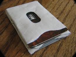 I recently saw a fantastic video on how to glue several sleeves together to make a simplistic wallet. Super Thin Tyvek Card Sleeve Wallet 7 Steps Instructables