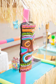 Use reed fencing to create the front of your tiki bar and secure it in place with a staple gun. Easy Pvc Pipe Tiki Bar For Your Luau Party Tutorial Tip Junkie