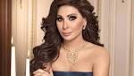 صور: إليسا "بلا ملابس" في
