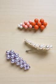 Making hair clips out of buttons is fun, easy and requires very few supplies. Pearl Hair Clip Diy