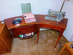 The most common sewing machine desk material is metal. Vintage 1950 S Necchi Sewing Machine Desk And Accessories Tested Works Estate Auction 36 K Bid