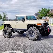 If you are a current fj cruiser owner, you can still count on getting great service from toyota service centers. Toyota Fj Cruiser Tan Truck Looks Like A Riot Rides On Gigantic Tires Autoevolution