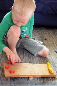 Weighing And Balancing How To Make A Simple Balance Preschool Math Preschool Science Learning Math