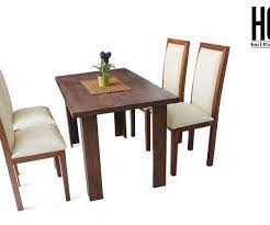 A round dining table gives an elegant look and the chairs are arranged in circle. Dining Tables Hoid Pk