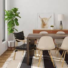 This idea combines both vibrant chairs with a wooden table that is able to tone down the vibrant colors. Rustic Eclectic Dining Room Inspiration Eclectic Dining Room Dining Room Inspiration Dining Room Design
