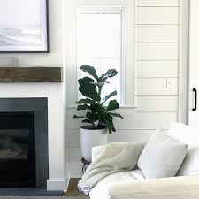 Spruce up your new or existing fireplace with a shiplap surround! Cottage Living Room With Shiplap Fireplace Wall Cottage Living Room